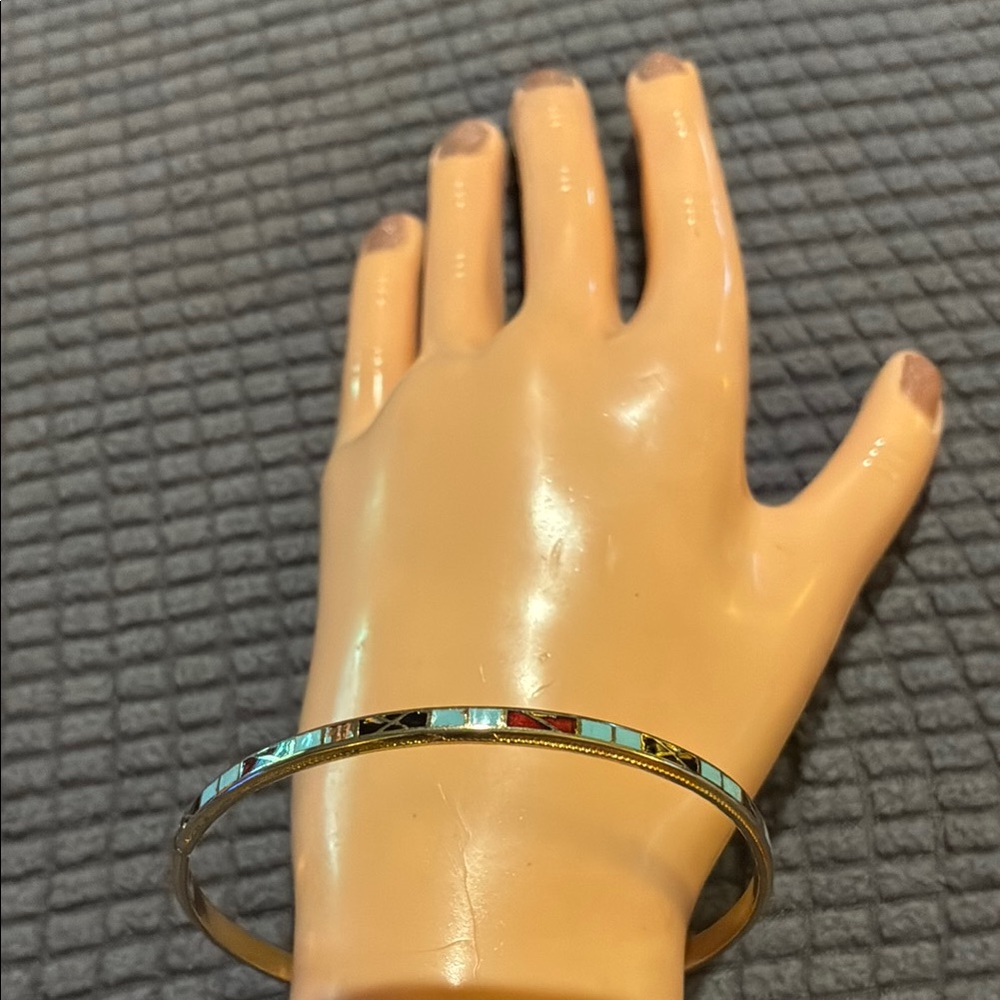 Elegant enameled Closene  Bangle Bracelet w/gold tone on inside of the bangle